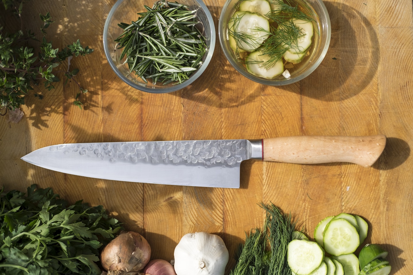 sliced vegetables and meat on chopping board
